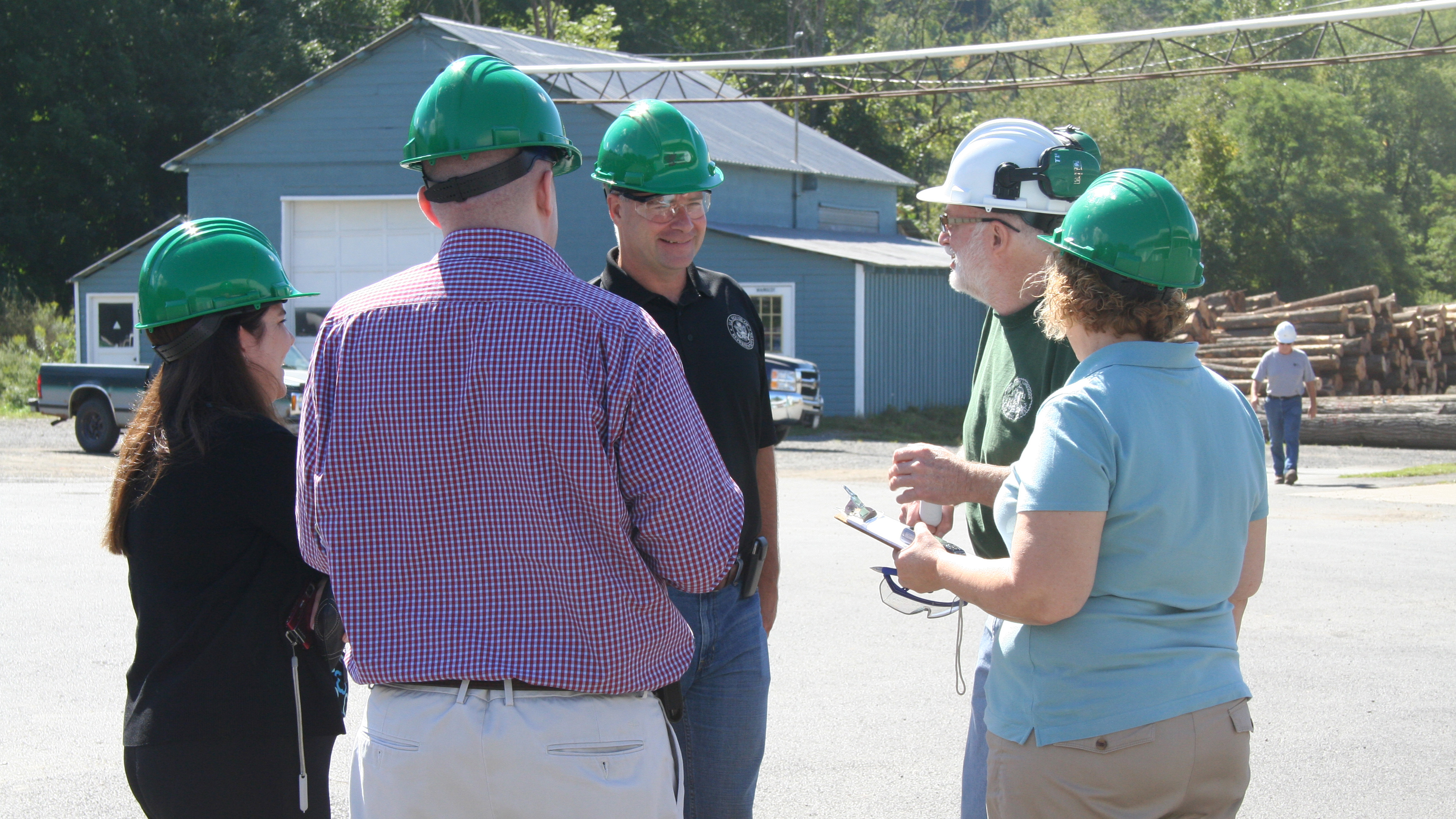 Rep. Chris Gibson of New York (R, 19th District), lead co-sponsor of the POWER Act, joins Pew’s Jessica Lubetsky on a tour of a waste heat to power project at Wightman Lumber in Portlandville, New York (Aug. 29, 2014).