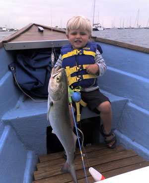 Boy with bluefish