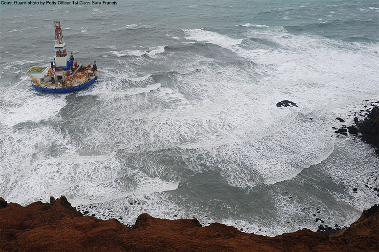 Drilling ship Kulluk sits aground on the southeast shore of Sitkalidak Island about 40 miles southwest of Kodiak City, Alaska, in 40 mph winds and 20-foot seas Tuesday, Jan. 1, 2013.