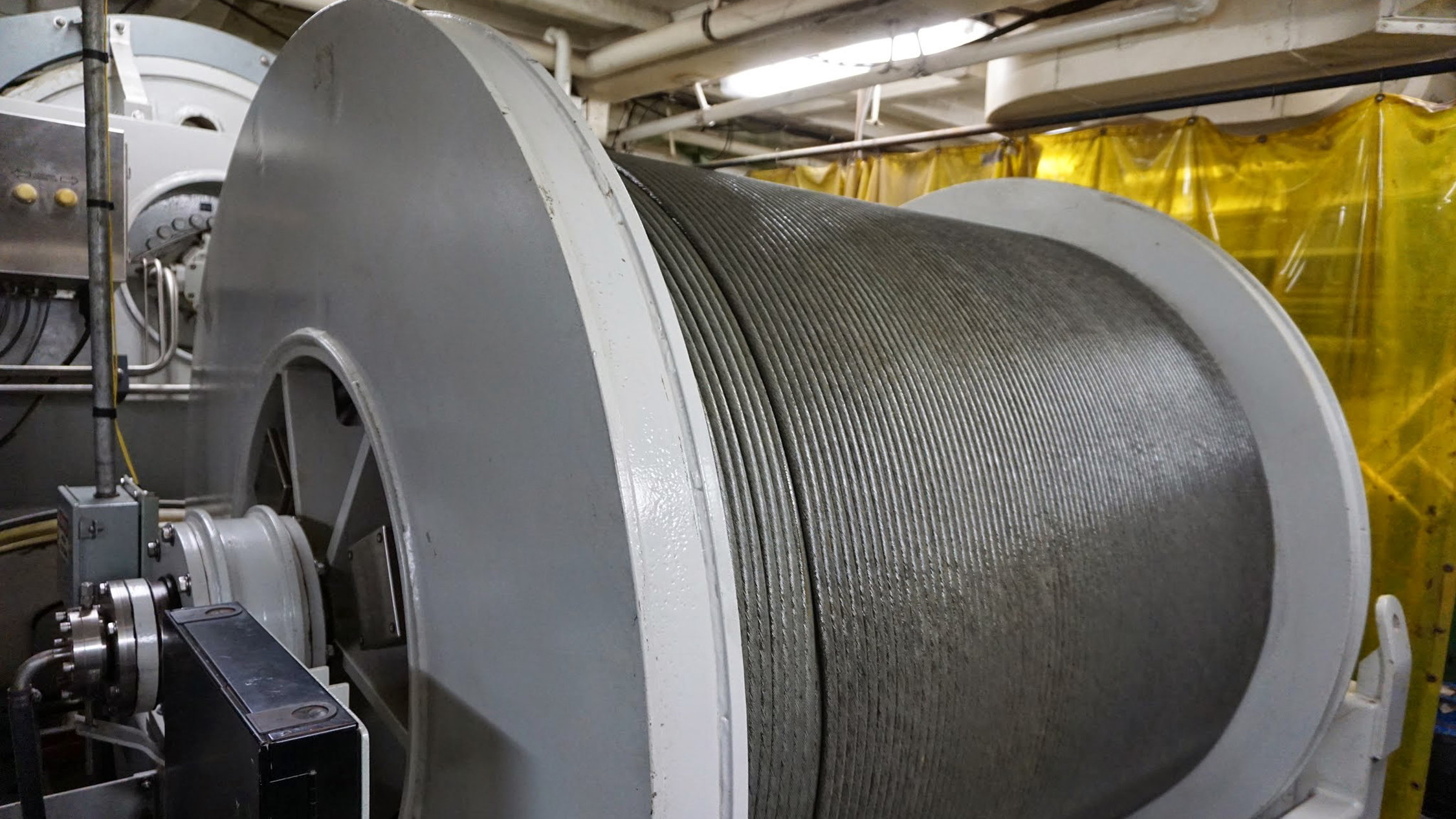A massive winch lowers Deep Discoverer using a 0.68-inch-wide, 26,000-foot-long cable.