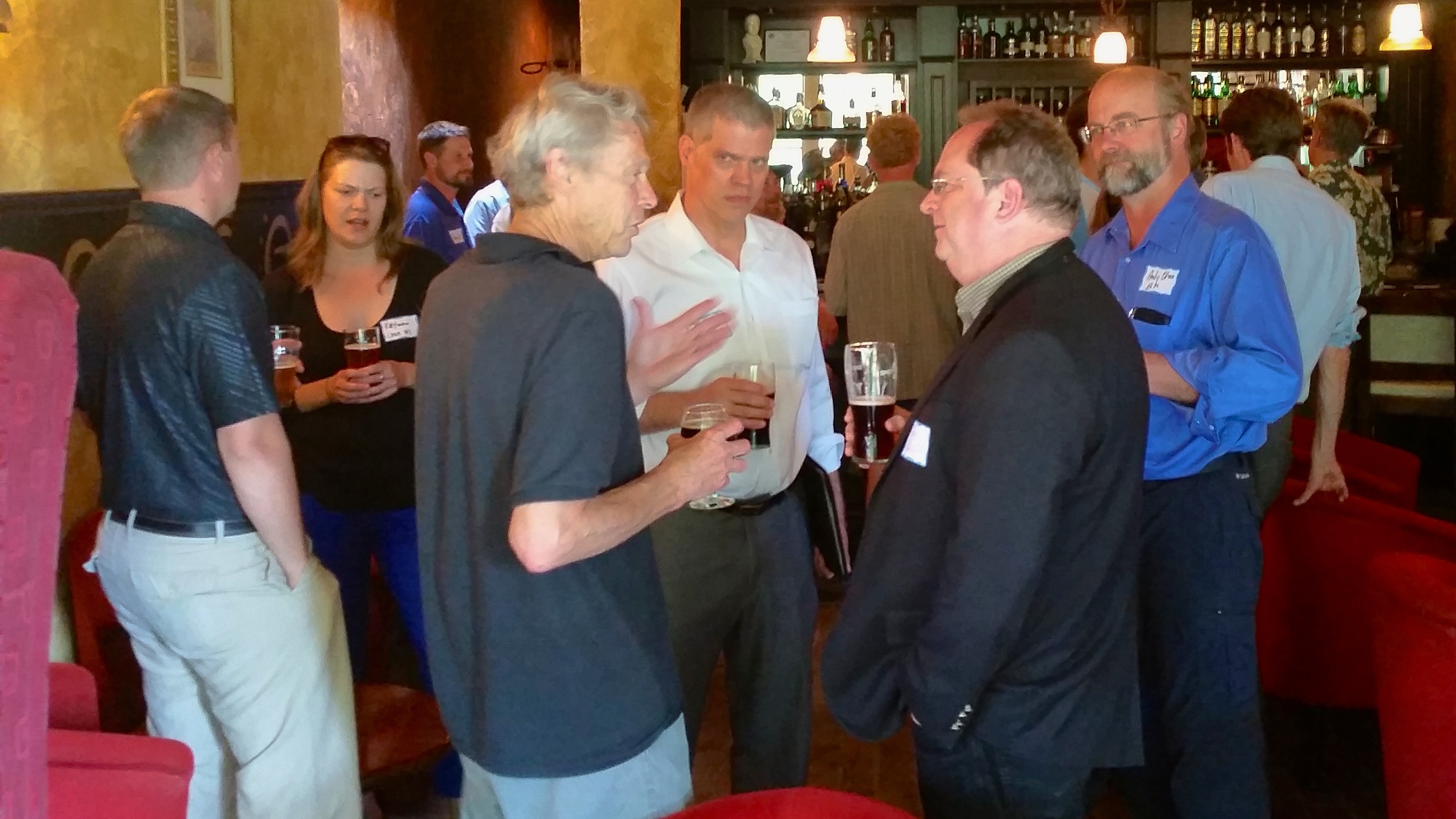 CEBN members network after a policy briefing in Madison, Wisconsin (July 10, 2014).