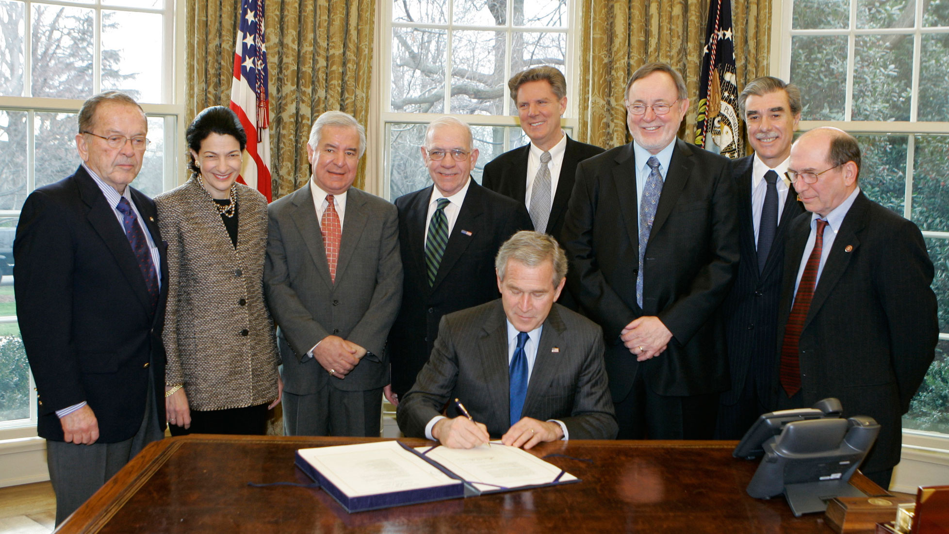 President Bush signs the Magnuson-Stevens Fishery Conservation and Management Reauthorization Act of 2006, Friday, Jan. 12, 2007 in the Oval Office of the White House in Washington.