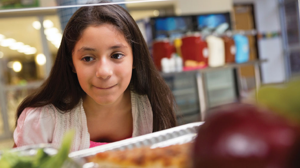 Girl in lunch line.