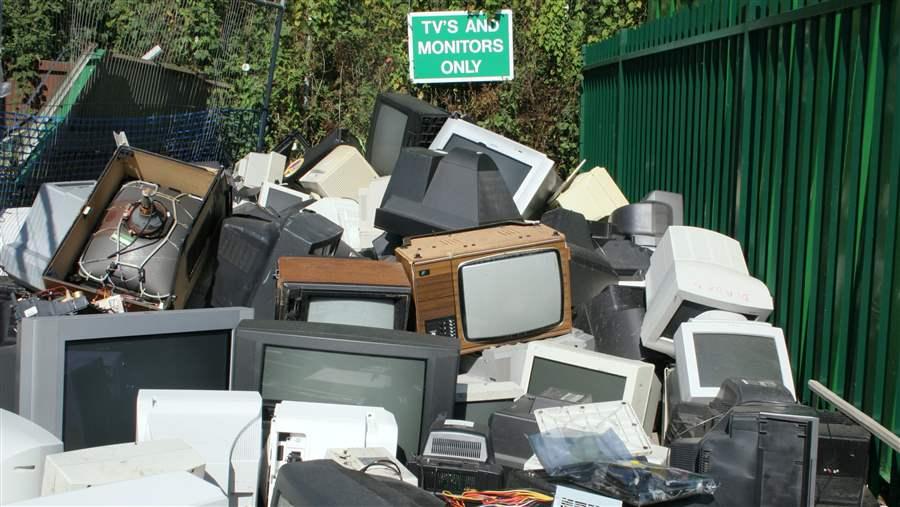 A pile of old tvs