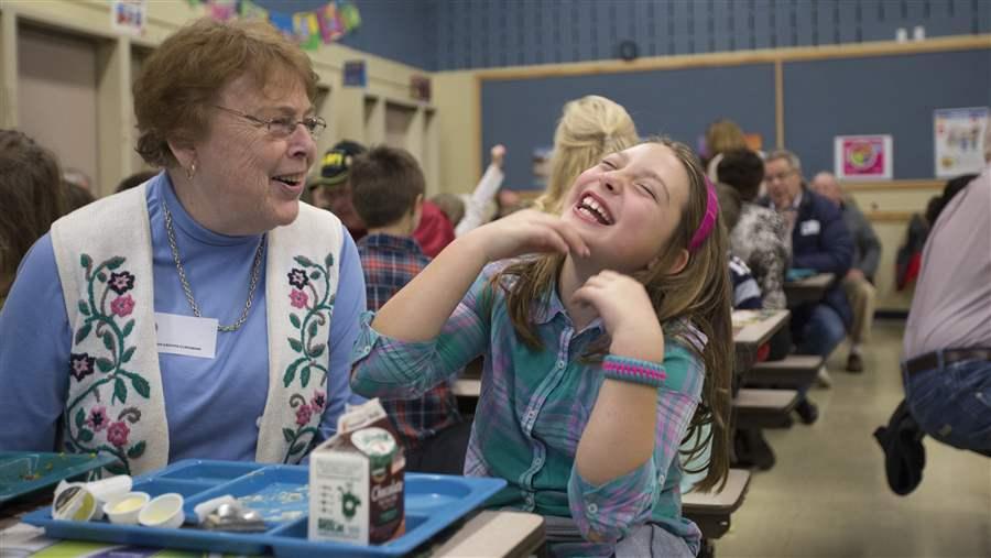 Girl with grandmother at lunch