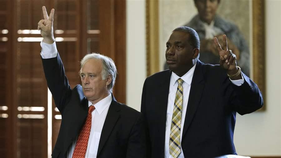 Democratic state Sens. Kirk Watson and Royce West