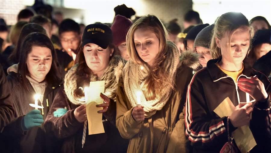 Millersville University students attend a candlelight vigil