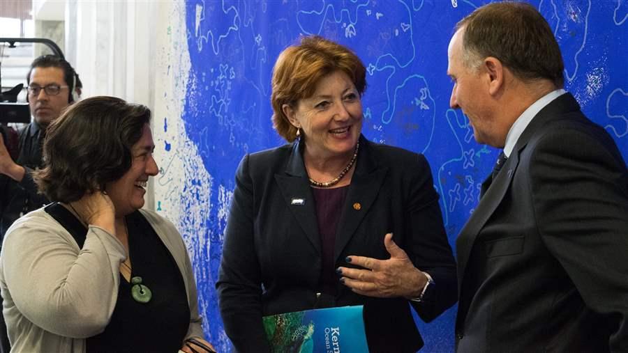 Pew's Bronwen Golder, Minister for Conservation Maggie Berry, and Prime Minister John Key