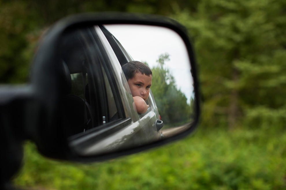 Sophia and Ray Rabliauskas' grandchild in a rearview mirror.