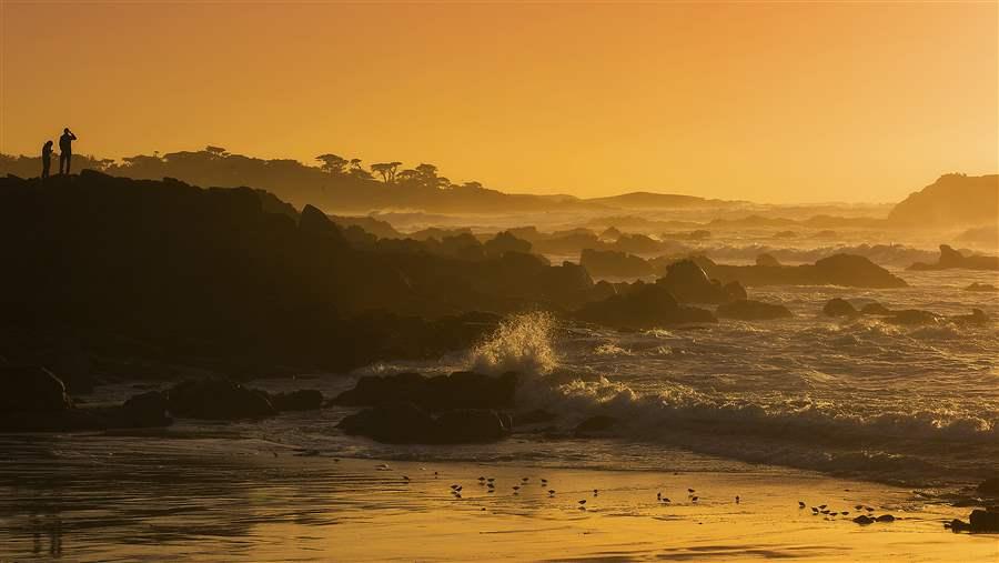 The sunset over Pebble Beach, California