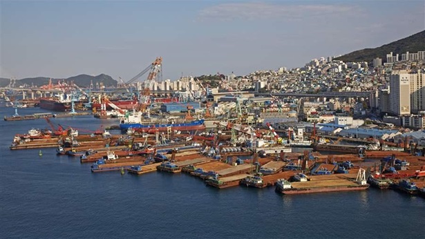 Elevated cityscape of industrial harbour in Busan.