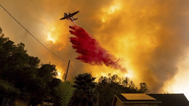 Air tanker fighting fire