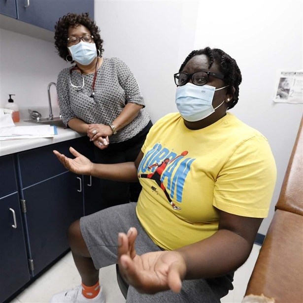 Patient with physician Patient with physician