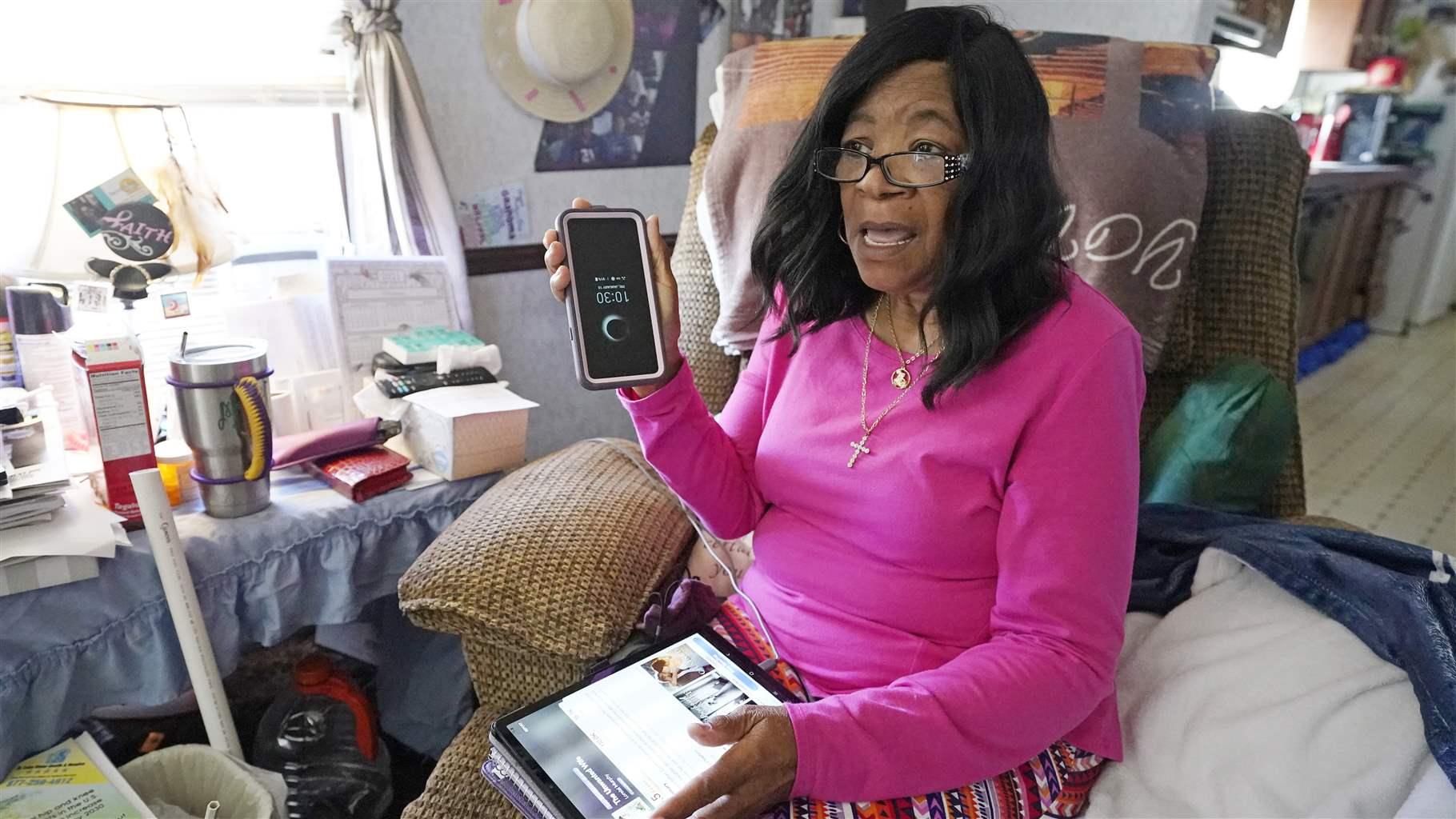 Senior with phone and tablet Senior with phone and tablet