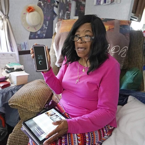 Senior with phone and tablet Senior with phone and tablet