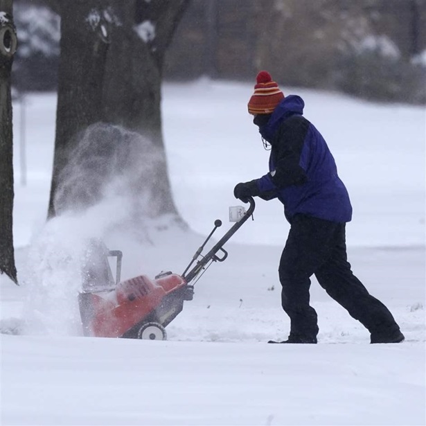 Man clearing snow