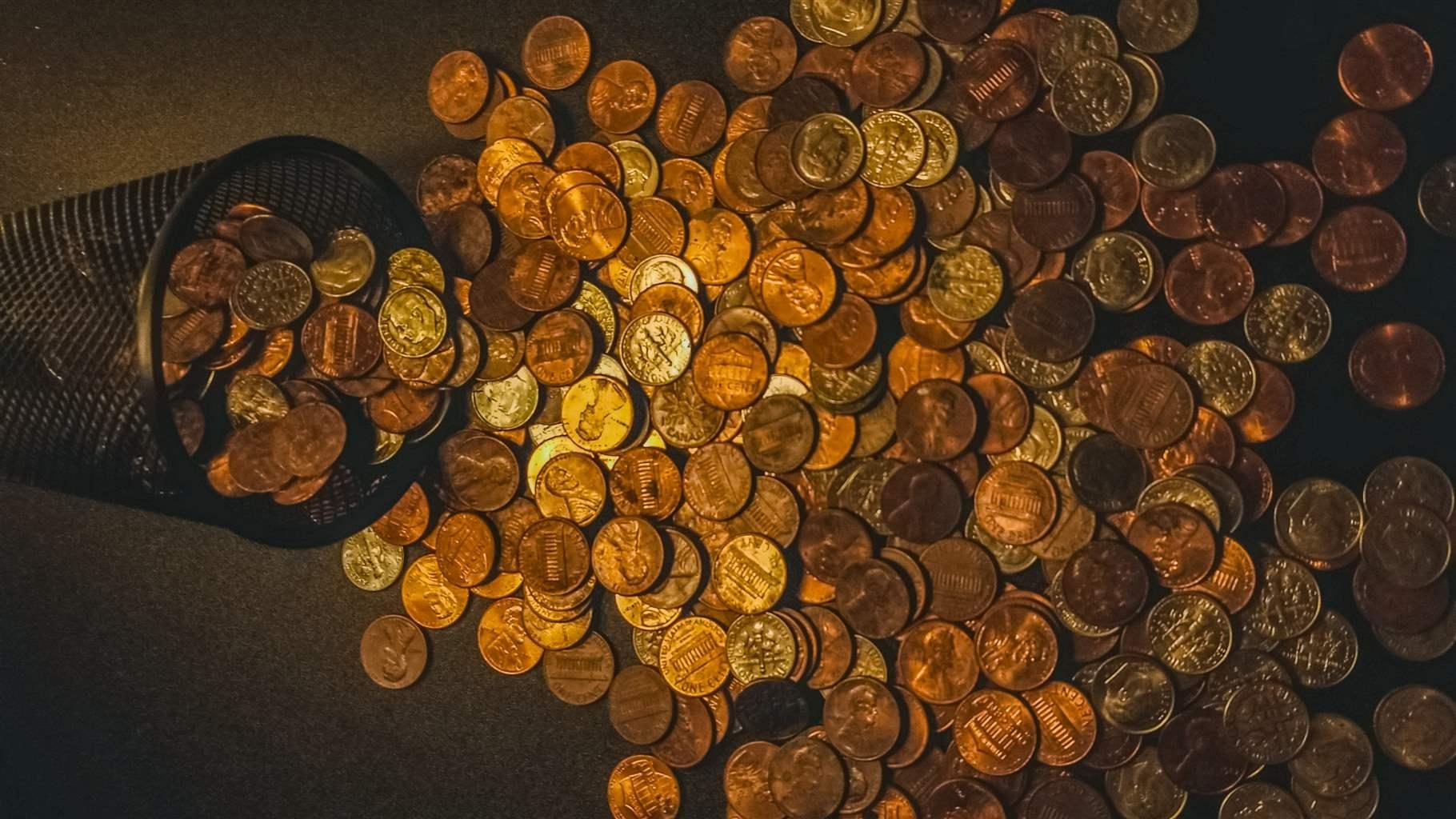 Coin jar spilling