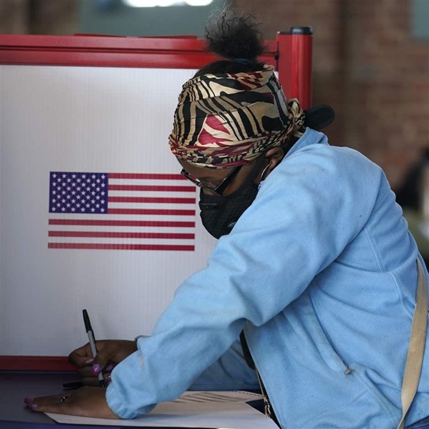 Person casting ballot Person casting ballot