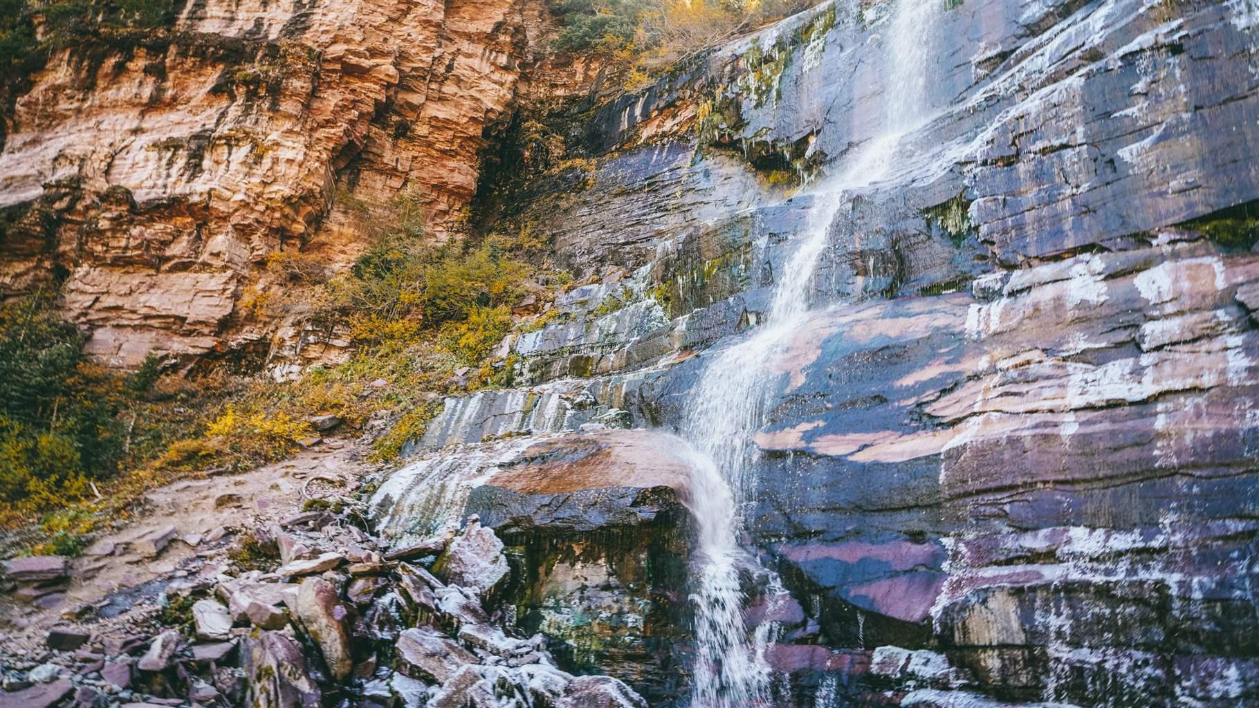 Bear Creek Falls (above) near Telluride, is a popular hiking destination, while the creek is a source of drinking water for local 