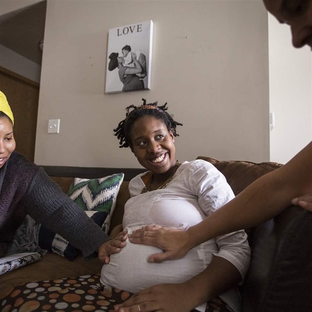 pregnant woman with two doulas pregnant woman with two doulas