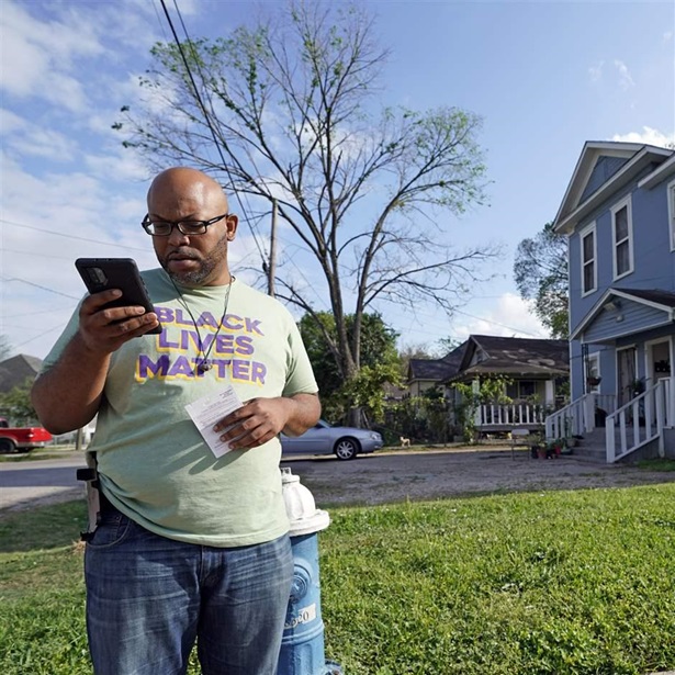 Community activist on phone Community activist on phone