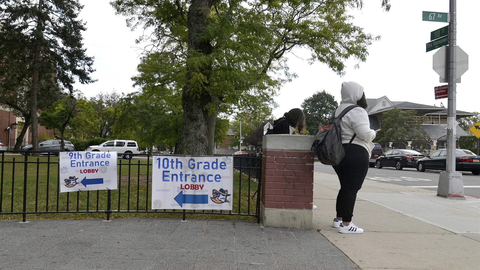 NEW SHUT DOWN AS NYC SWITCHES FROM ZIP CODES TO COLORED Forest Hill High School Students wait to hear if they will return to remote learning after their school was placed in the "red zone", in the Queens borough of New York City, NY, October 7, 2020.