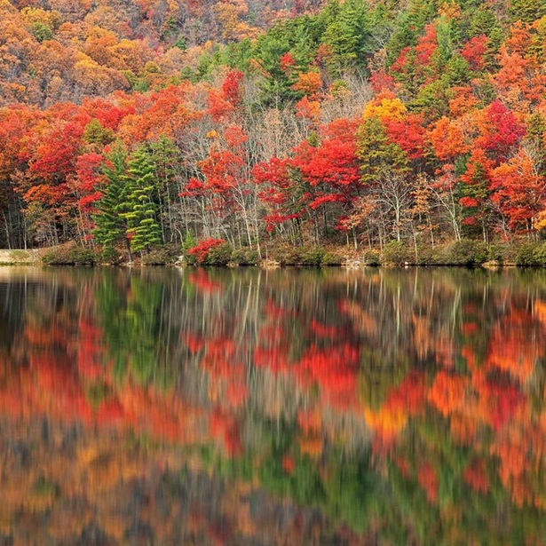 Autumn colors reflect off Sherando Lake in the George Washington National Forest 