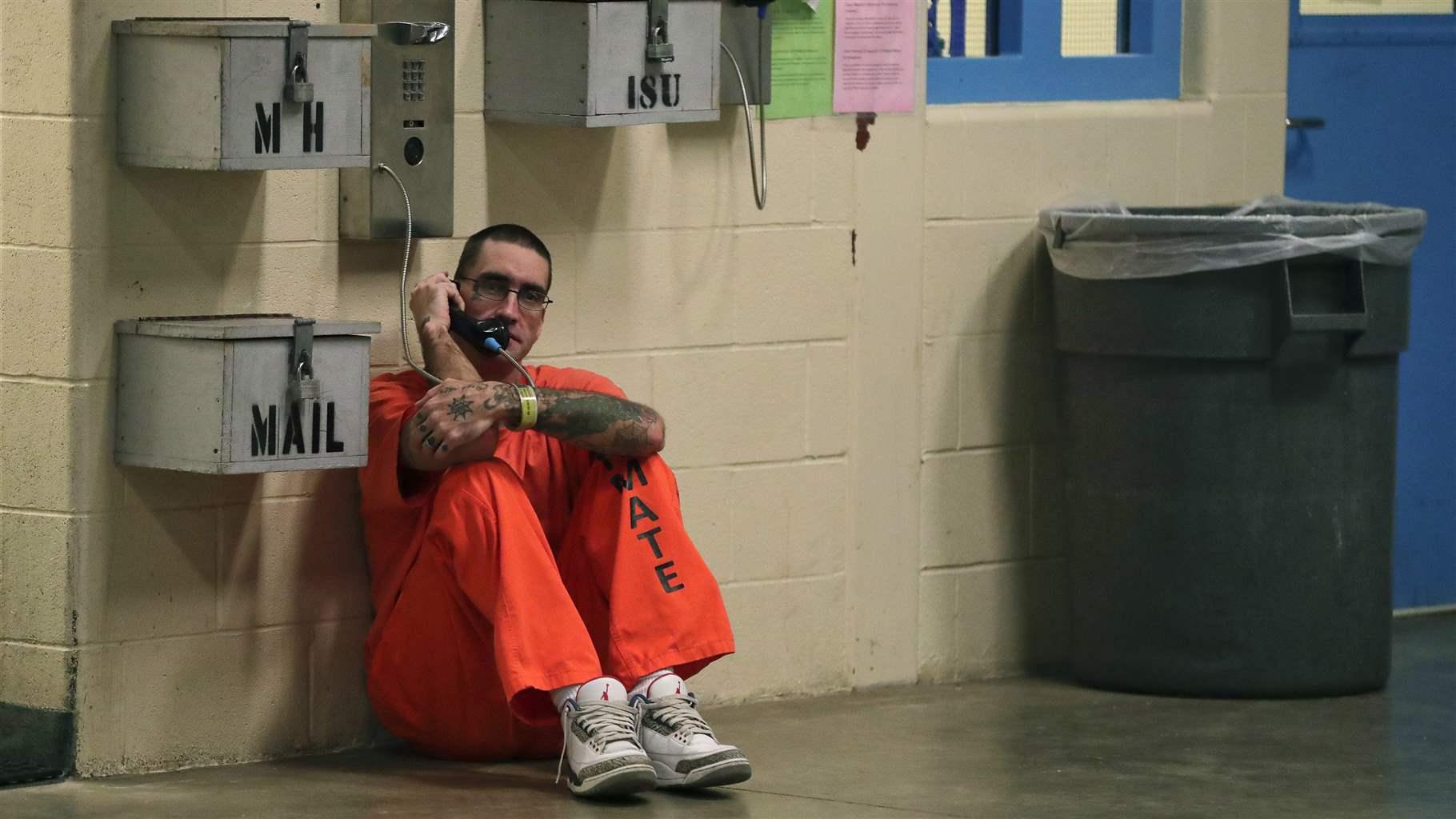 Inmate on phone