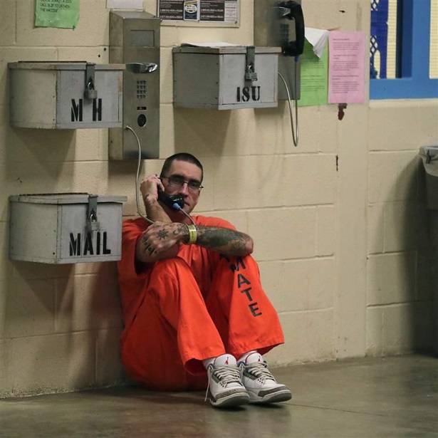 Inmate on phone