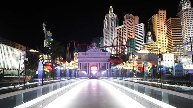 A nearly empty footbridge leads toward New York-New York Hotel & Casino on the Las Vegas Strip, where most businesses have been closed since March 17 in response to the coronavirus (COVID-19) pandemic, on May 23, 2020 in Las Vegas, Nevada.