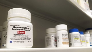 Buprenorphine bottle on shelf which is a common drug to help with opioid or heroine withdrawal.