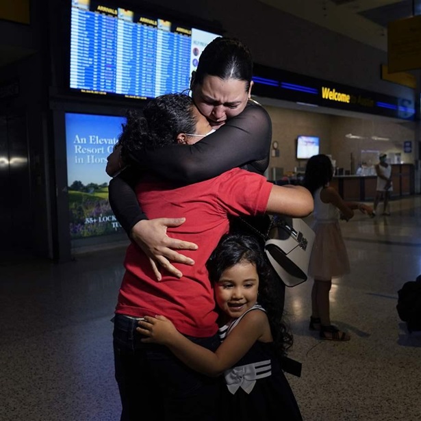 Mother and daughters reuinited at airport Mother and daughters reuinited at airport