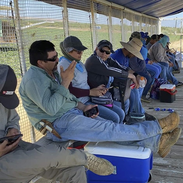Farmworkers at Del Bosque Farms take a break from picking melons in Firebaugh, Calif., on Friday, July 9, 2021, where temperatures were expected to surpass 110 degrees this weekend.
