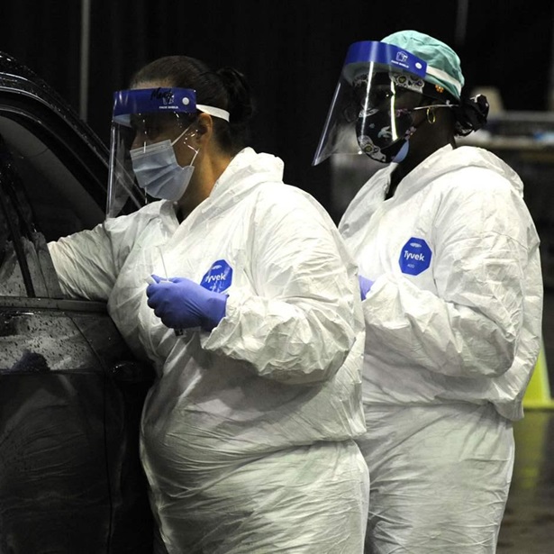 VIRUS OUTBREAK-ALABAMA-YOUNG PEOPLE In this Aug. 12, 2021 file photo, workers from USA Health test a person for COVID-19 during a drive-up clinic in Mobile, Ala. Health officials say they are seeing a spike in cases among young adults and children as the highly contagious delta variant sweeps through unvaccinated populations.