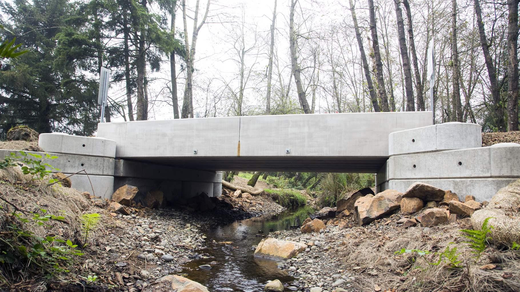 This bridge over Oregon’s Tomlinson Creek replaced a culvert, a project that restored the steam’s natural flow and allows for fish passage.