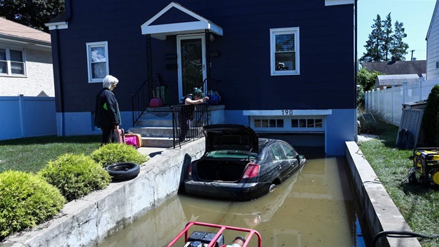 A car sits on a flooded garage of a house following a night of heavy wind and rain from the remnants of Hurricane Ida on September 02, 2021 in Mamaroneck, New York