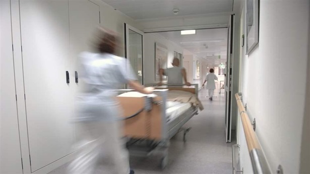 healthcare health care hospital medicine medicare gurney doctor patient costs hall wing wellness