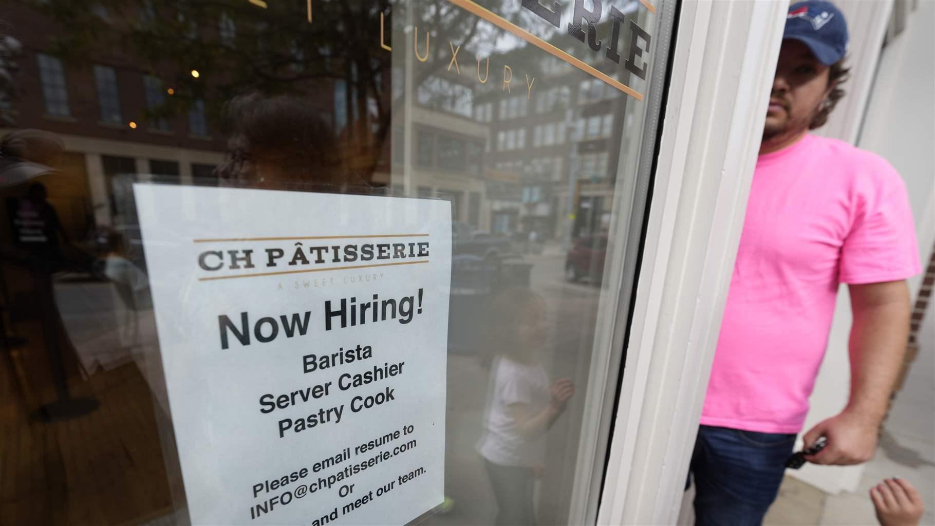 A hiring sign in Sioux Falls, S.D., beckons potential workers