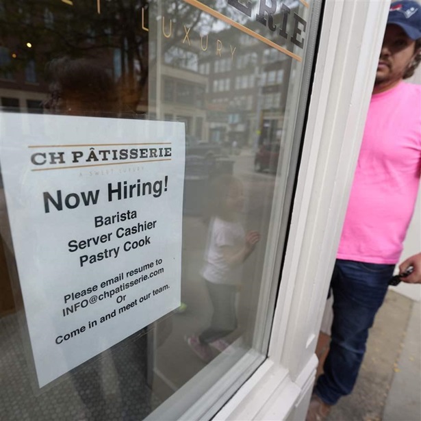 A hiring sign in Sioux Falls, S.D., beckons potential workers