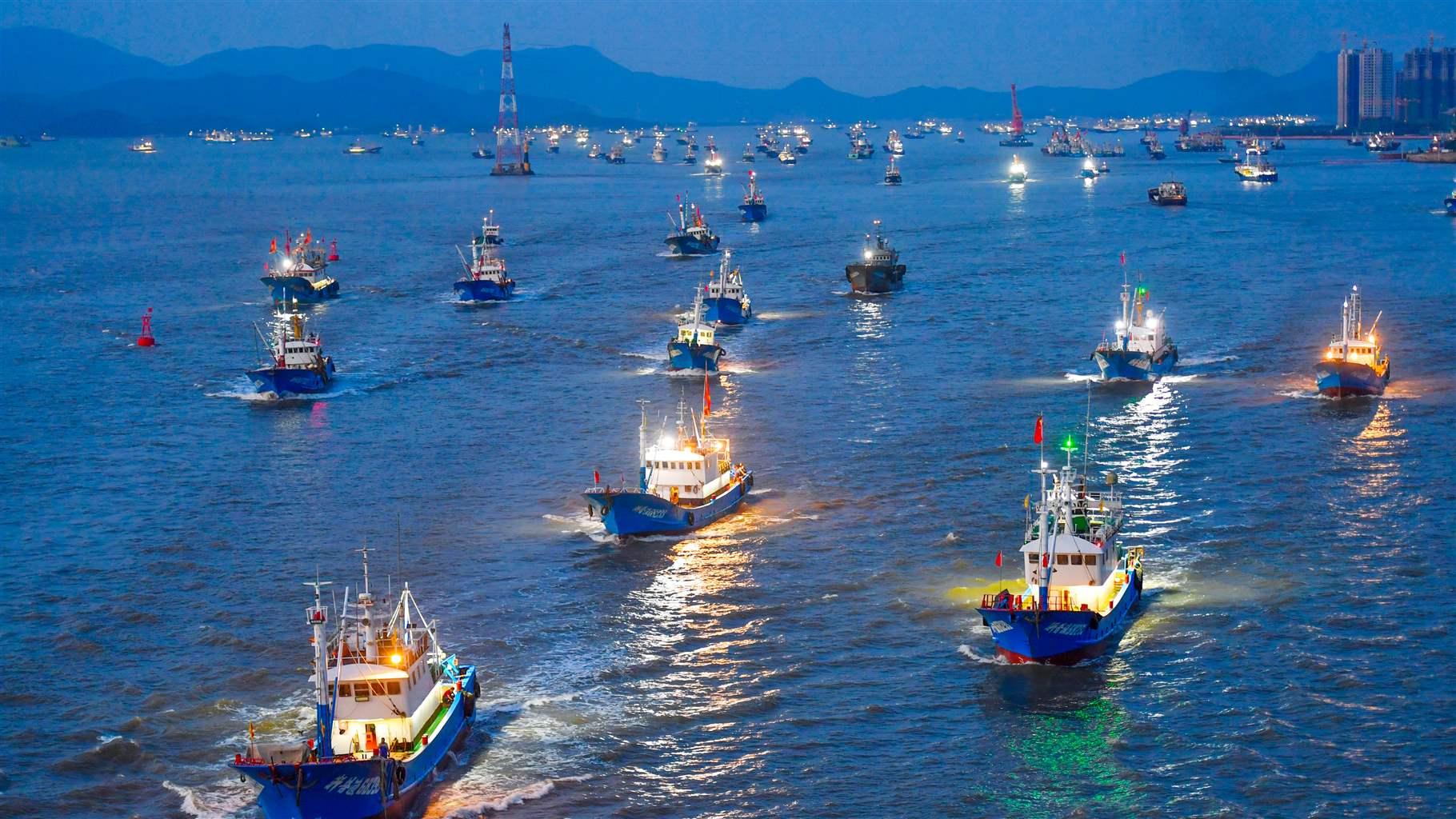 Fishing boats set sail in the morning to East China Sea for fishing on September 17, 2021 in Zhoushan, Zhejiang Province of China.