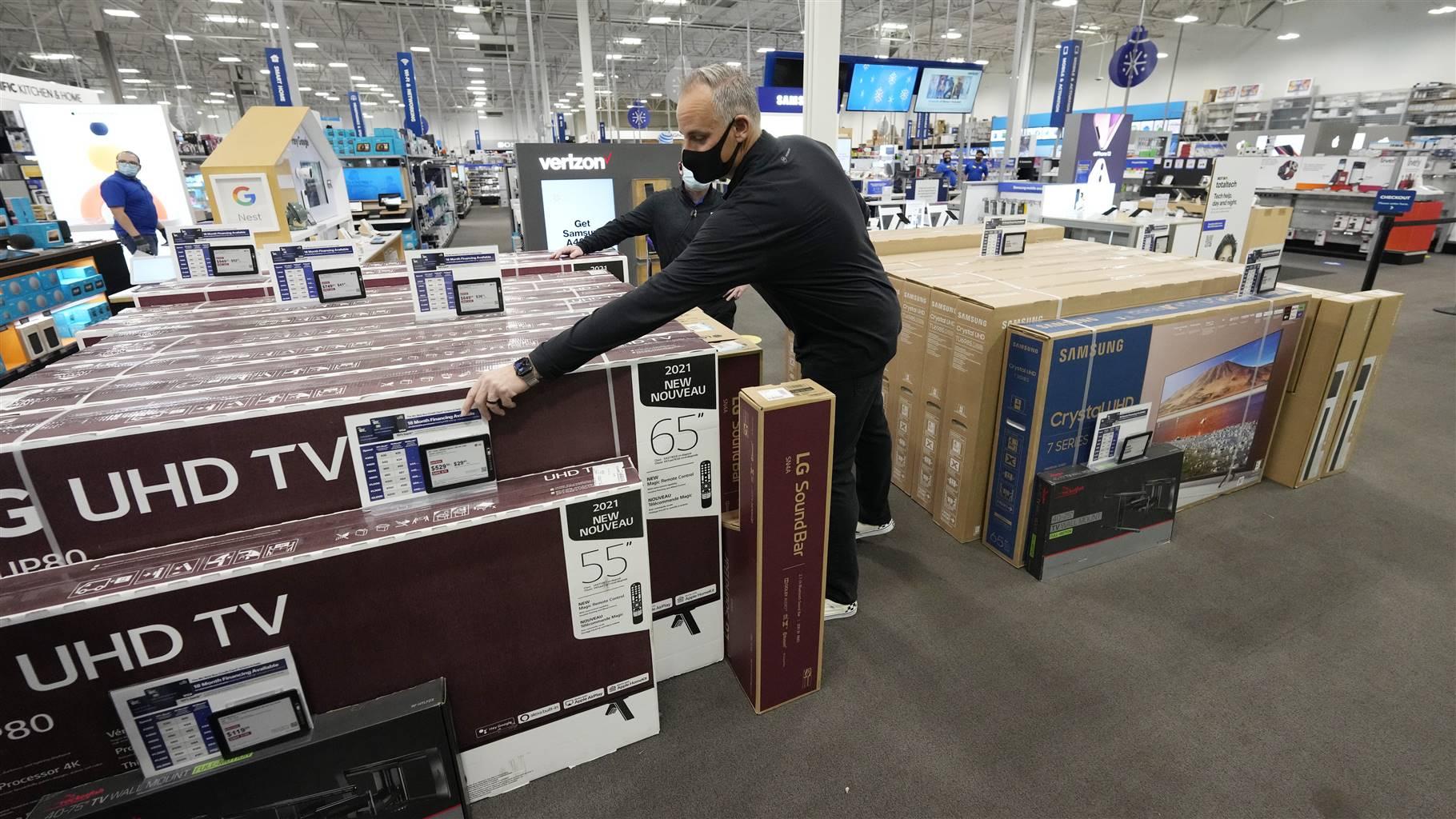 Workers at a Best Buy store in Lone Tree, CO, prepare for shoppers on Black Friday. Inflation is one of the challenges facing retailers and customers as the holiday shopping season slides into high gear.  