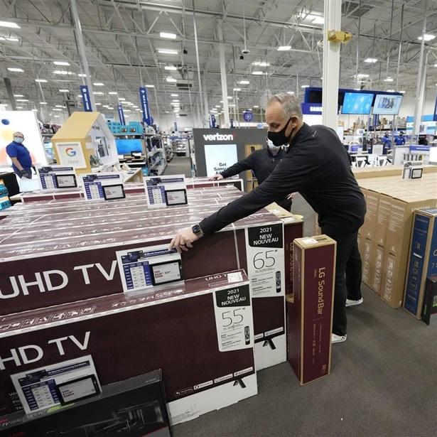 Workers at a Best Buy store in Lone Tree, Colo., prepare for shoppers on Black Friday. Inflation is one of the challenges facing retailers and customers as the holiday shopping season slides into high gear.  