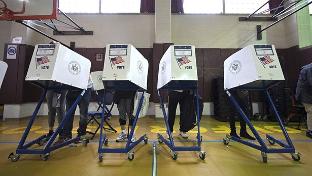 Voters fill out their ballots behind privacy booths during 2021 New York City elections at Public School 183, New York, NY, November 2, 2021.