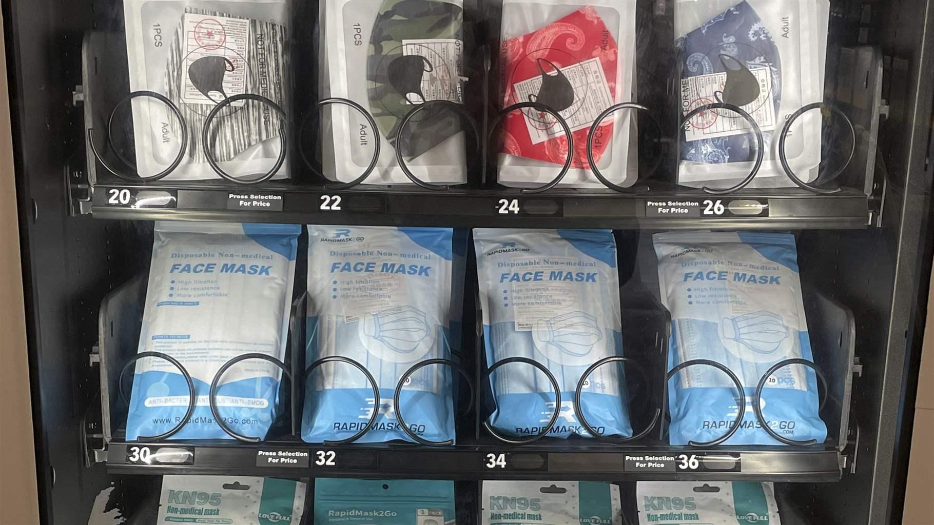 A vending machine filled with masks.