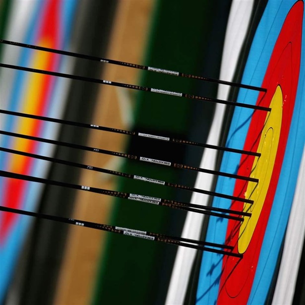 Arrows are seen embedded in a target during practice for the women's individual eliminations match on August 17, 2004 during the Athens 2004 Summer Olympic Games at Panathinaiko Stadium in Athens, Greece. 