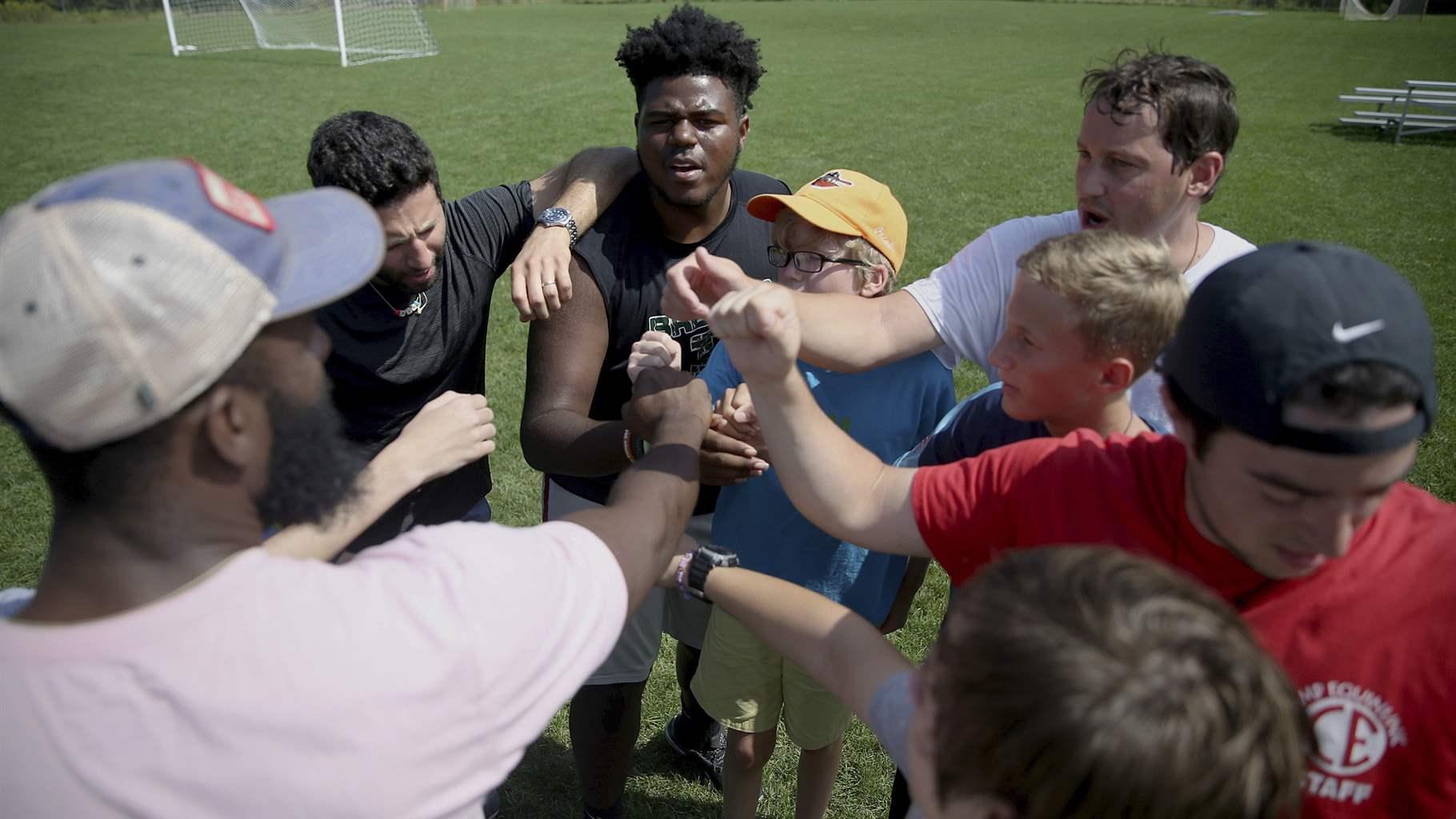 Huddle after soccer activity Huddle after soccer activity