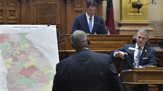 Georgia district map on display during a debate