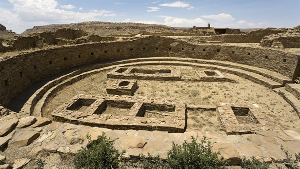 A landscape view of Chaco culture national historic park depicting remains of pueblo 