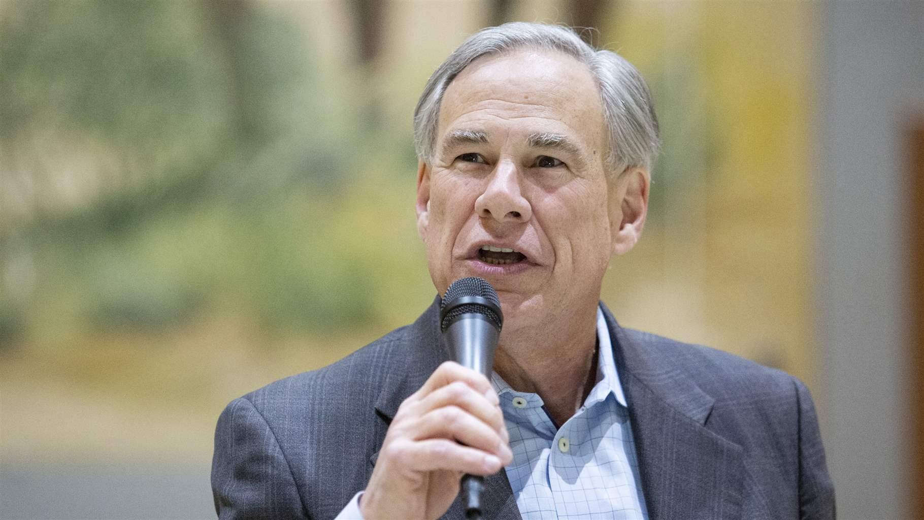 Texas Gov. Greg Abbott, a Republican, speaks at an event in February. Abbott asked the state protective services agency to investigate whether some medicine or elective surgeries are provided to transgender children.