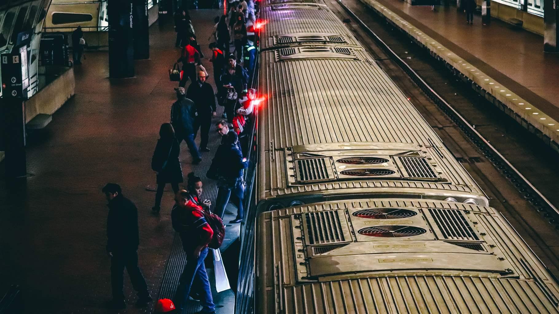 Passengers boarding Metro train